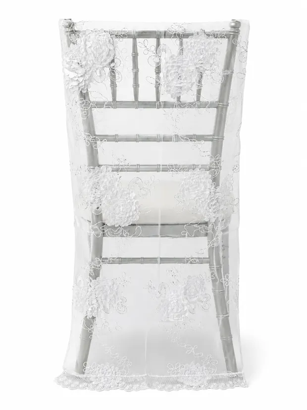 Embroidered lace chair cover on a Chiavari chair