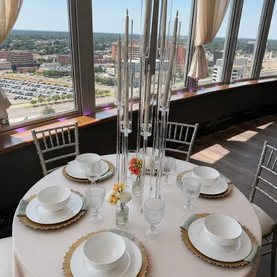 Champagne linen and gold sunburst chargers at Founders Tower