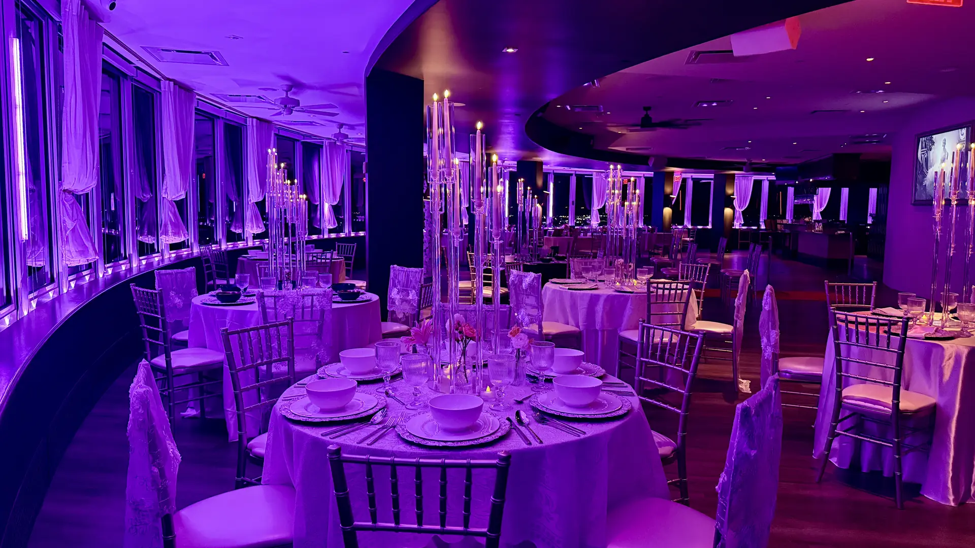 The Penthouse Lounge at Slate at Founders Tower at night