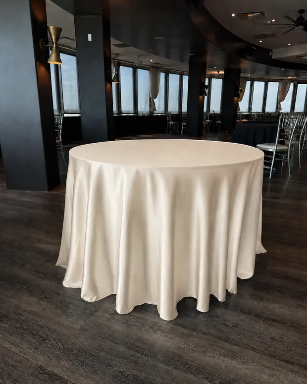 Champagne 120-inch round tablecloth set for six at Founders Tower, Oklahoma City