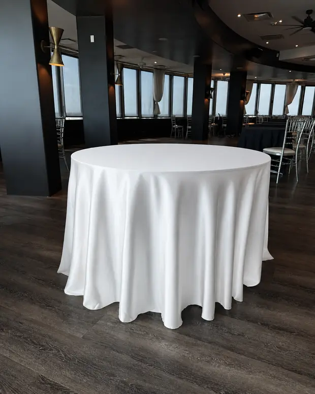 Ivory 120-inch round tablecloth set for six at Founders Tower, Oklahoma City